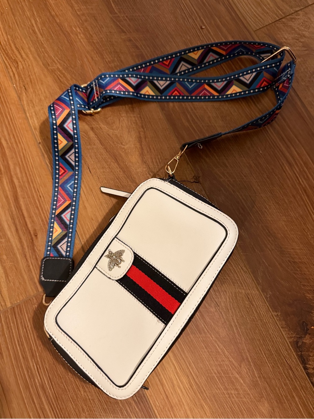 White Crossbody Phone Bag with Red and Black Stripe and Embellished Accent